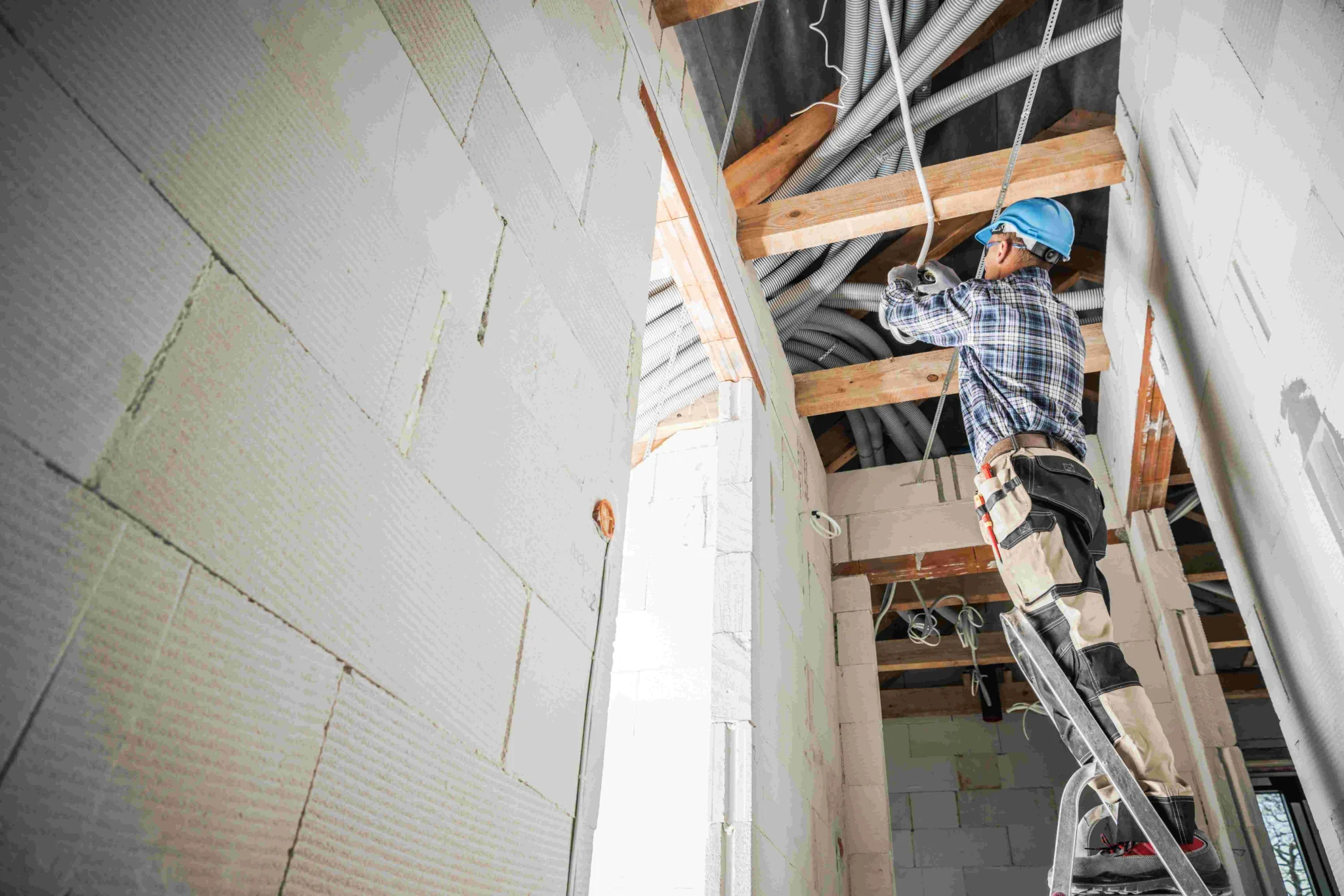 The Cozy Penguin team installing commercial insulation in a Central Pennsylvania facility