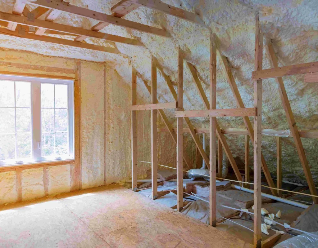 spray foam insulation-of-attic-with-fiberglass-cold-barrier spray foam insulation-of-attic-with-fiberglass-cold-barrier